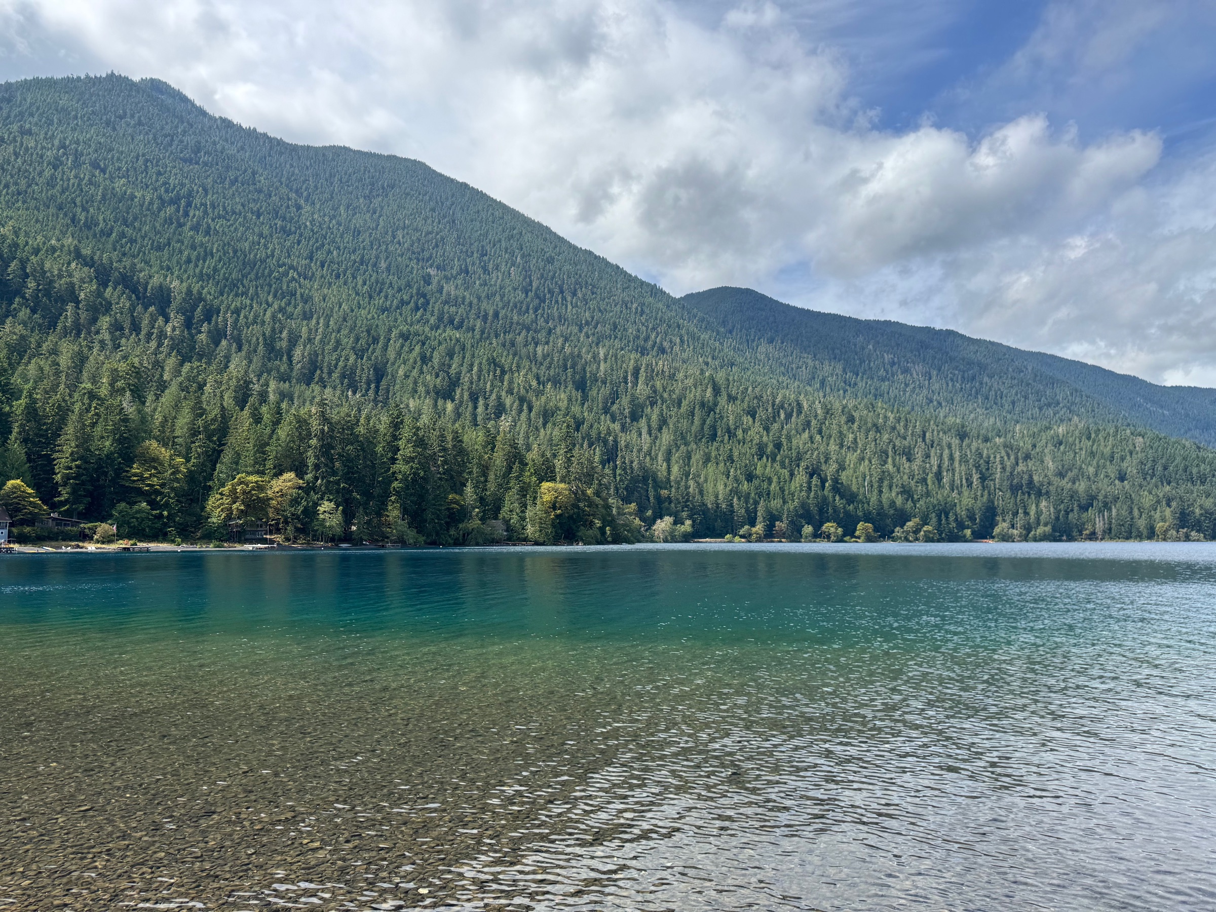 Lake Crescent: teal glacial water beneath the forested slopes of the Olympic Range, near Port Angeles, Washington