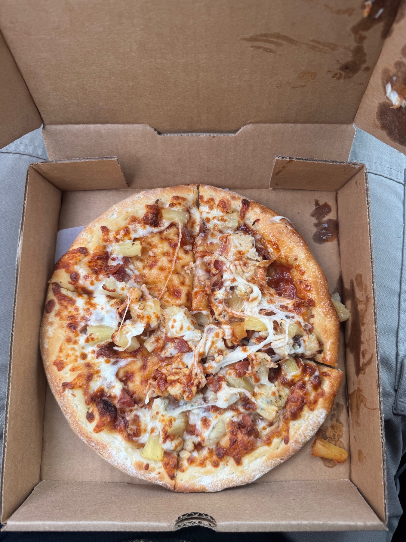 A custom-built take-and-bake pizza in its box from Home Slice in Forks, Washington